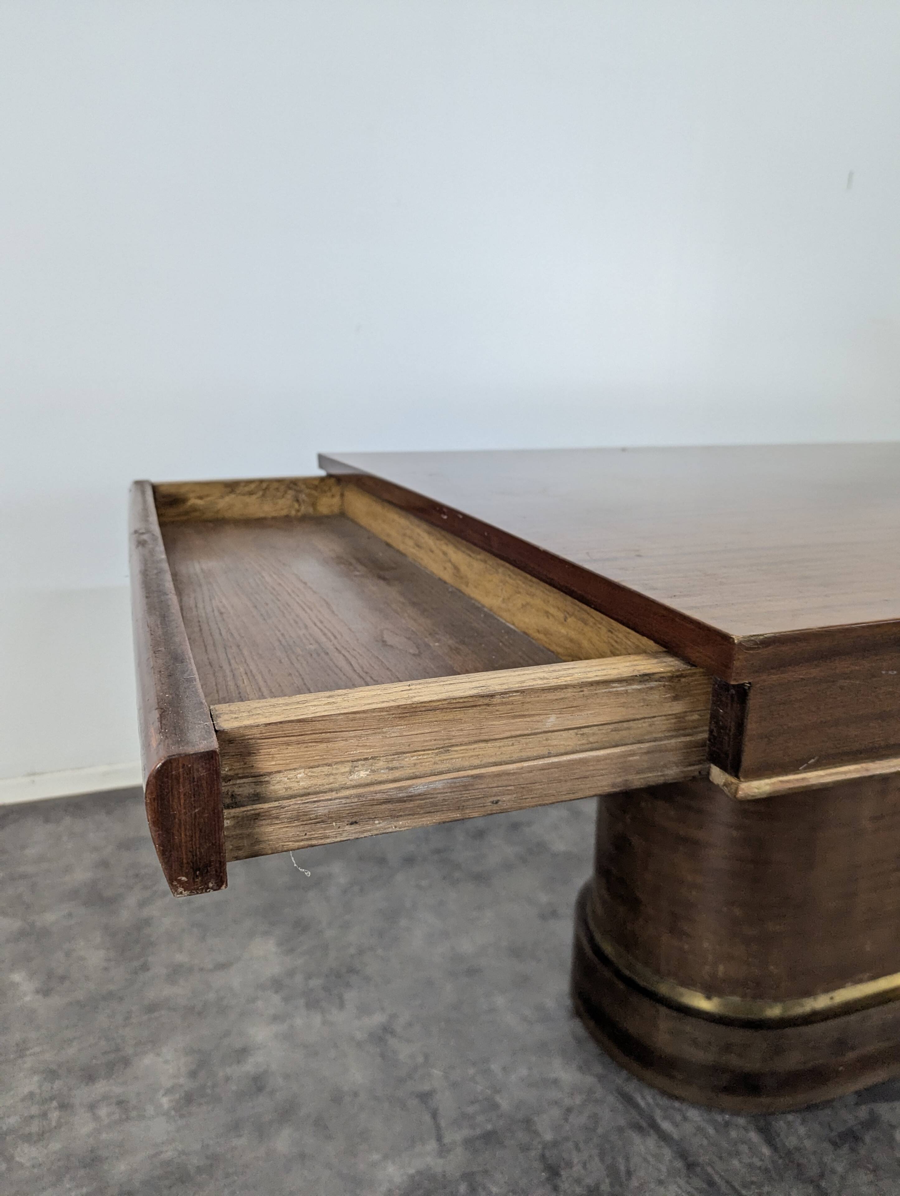 Modernist table in rosewood and brass