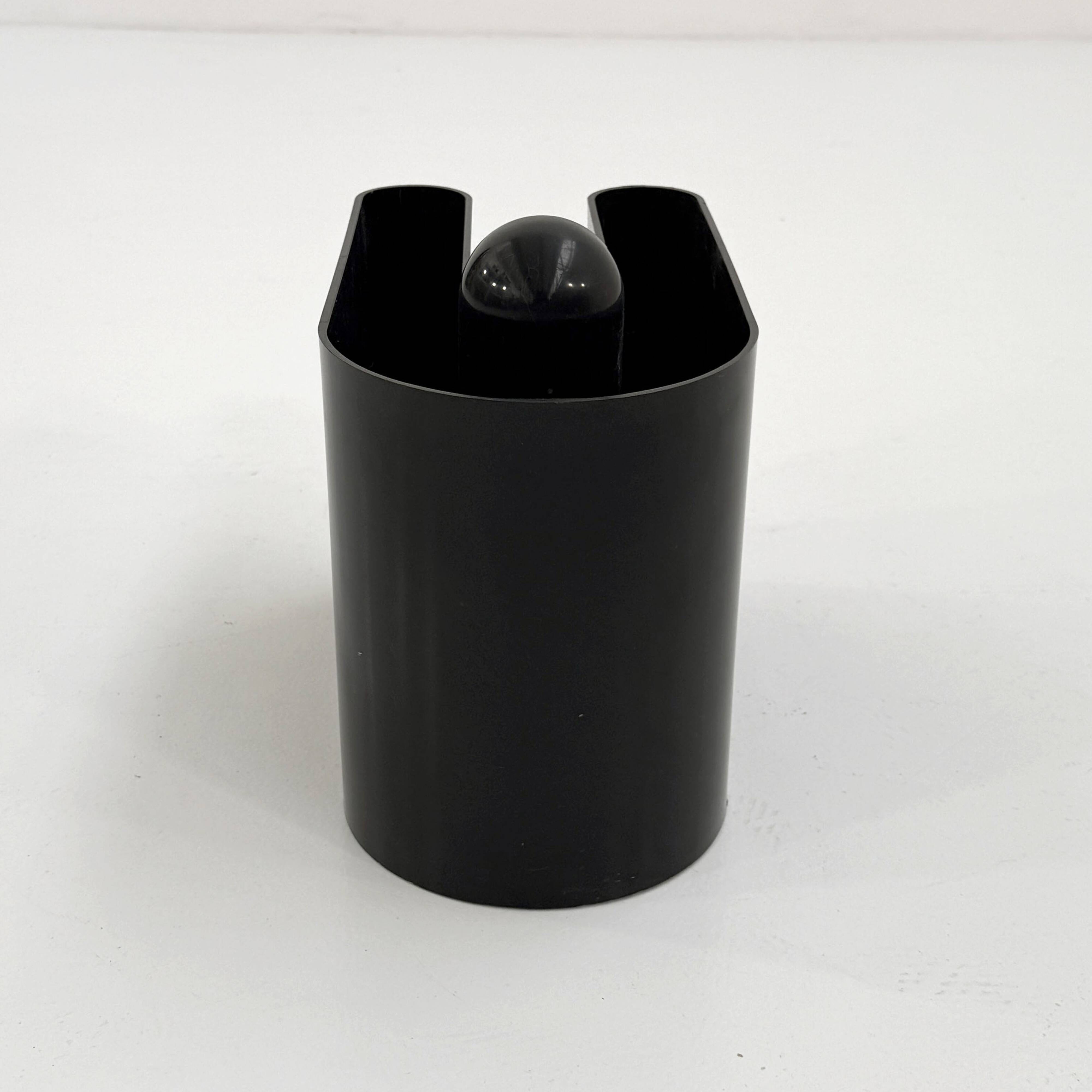 Black magazine rack by Rodolfo Bonetto for Bilumen, 1970