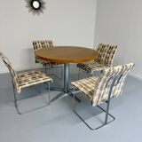 Old round table in solid wood and metal, vintage 70s design