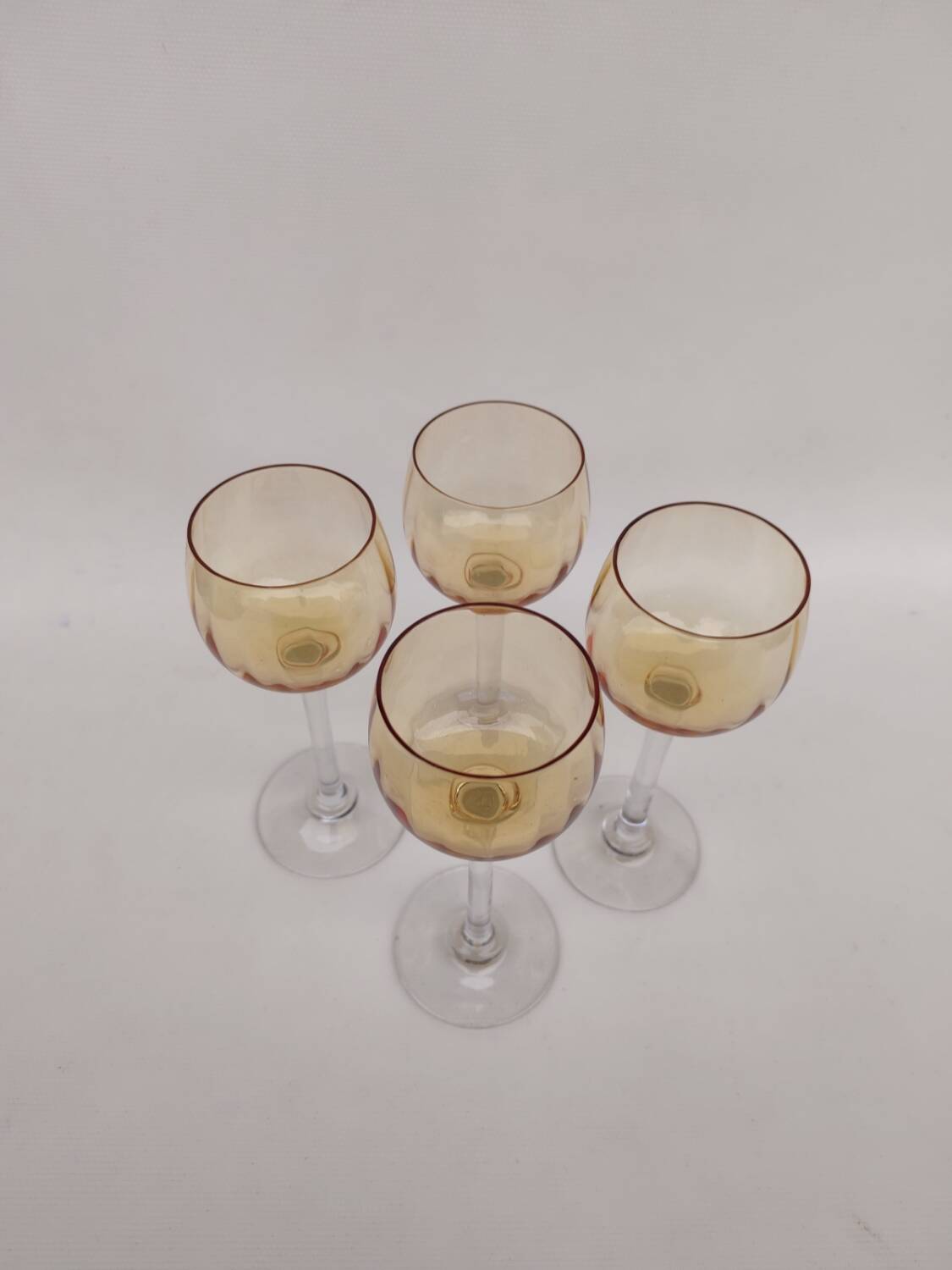 4 amber crystal glasses, first half of the 20th century.
