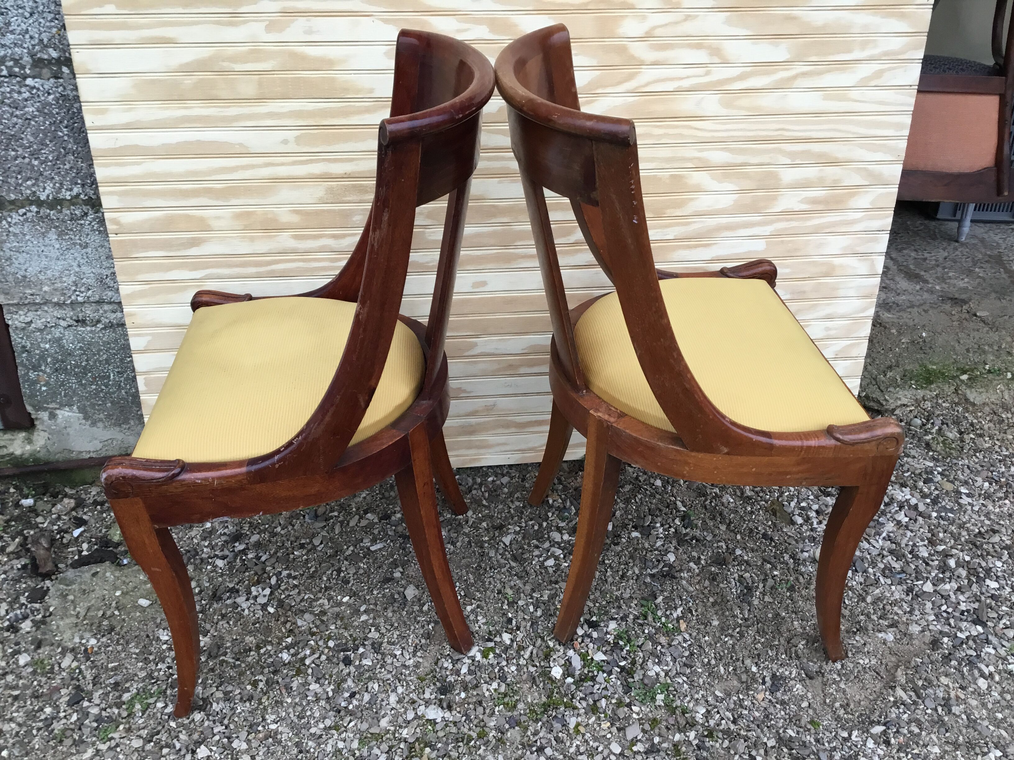 Pair of style restoration gondola chairs in mahogany XXth