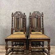 Set of 4 Renaissance style hunting lodge chairs in carved oak