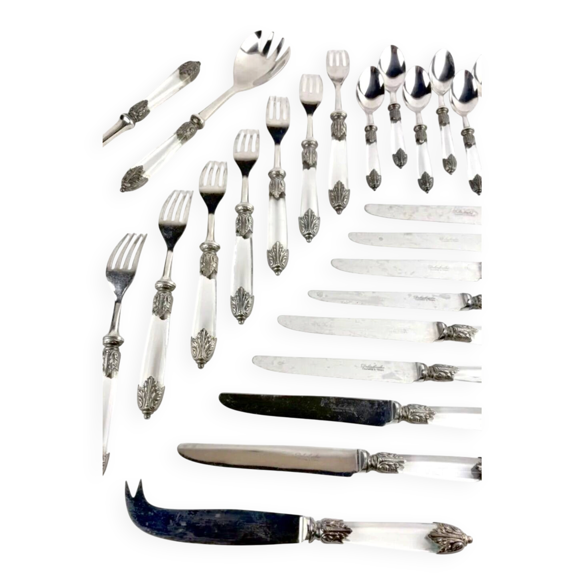 Silver-plated metal cutlery set, plexiglass and stainless steel.