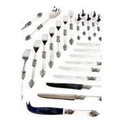 Silver-plated metal cutlery set, plexiglass and stainless steel.