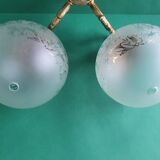 Pair of large double-light wall sconces in vintage brass and glass