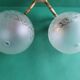 Pair of large double-light wall sconces in vintage brass and glass