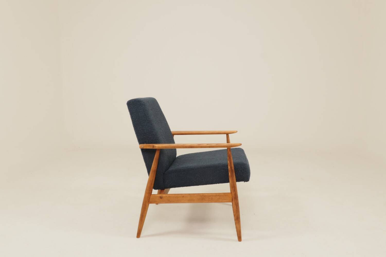 Scandinavian armchair in navy blue bouclé design by H. Lis