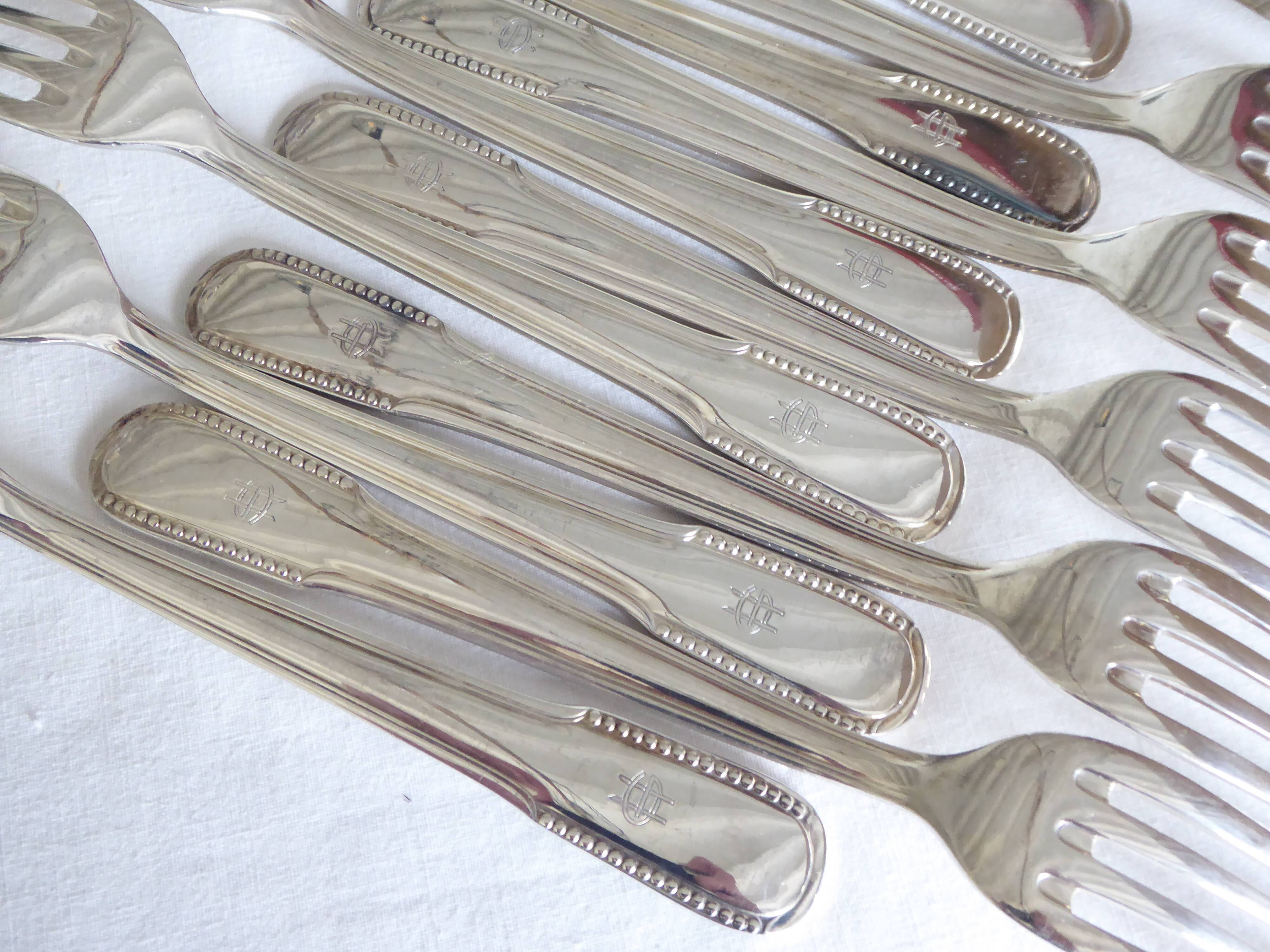 12 dessert forks, silver metal