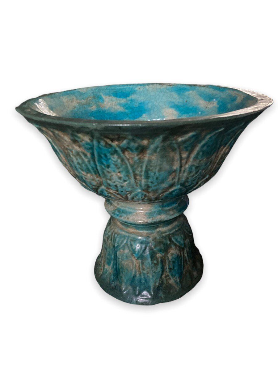 Diabolo shaped cut in blue glazed ceramic