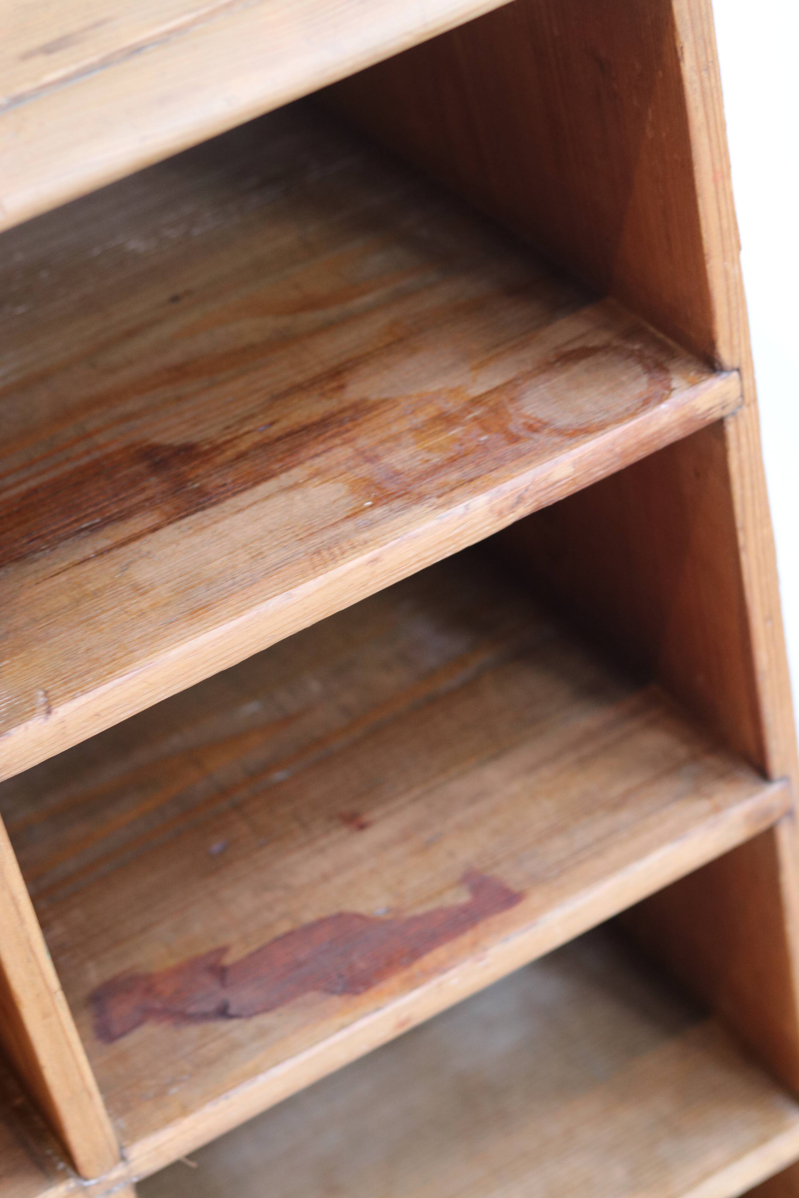 Large storage unit with compartments in waxed pine, early 20th century.