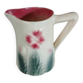Small antique jug in slipware.