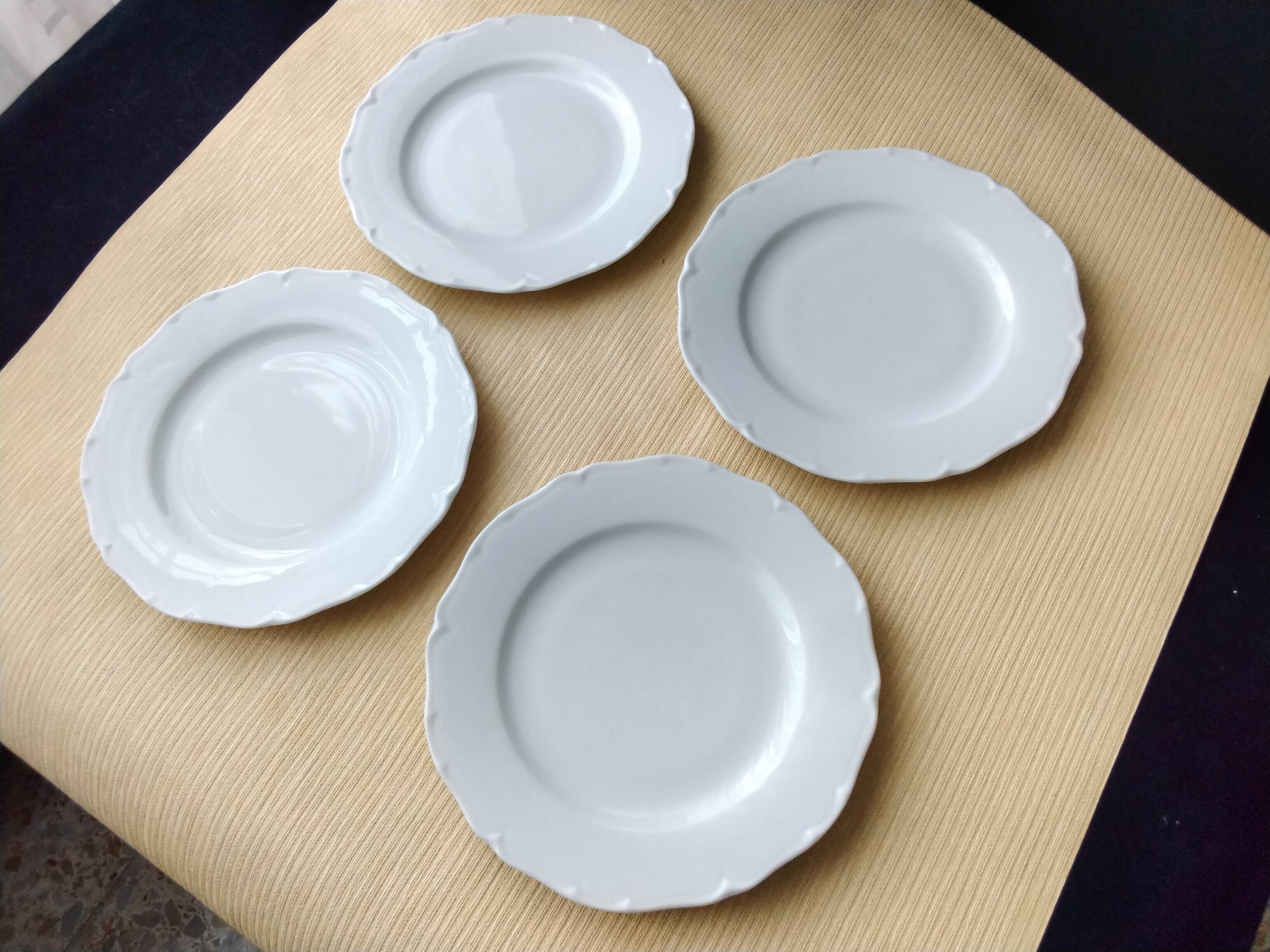 4 white Limoges porcelain dessert plates