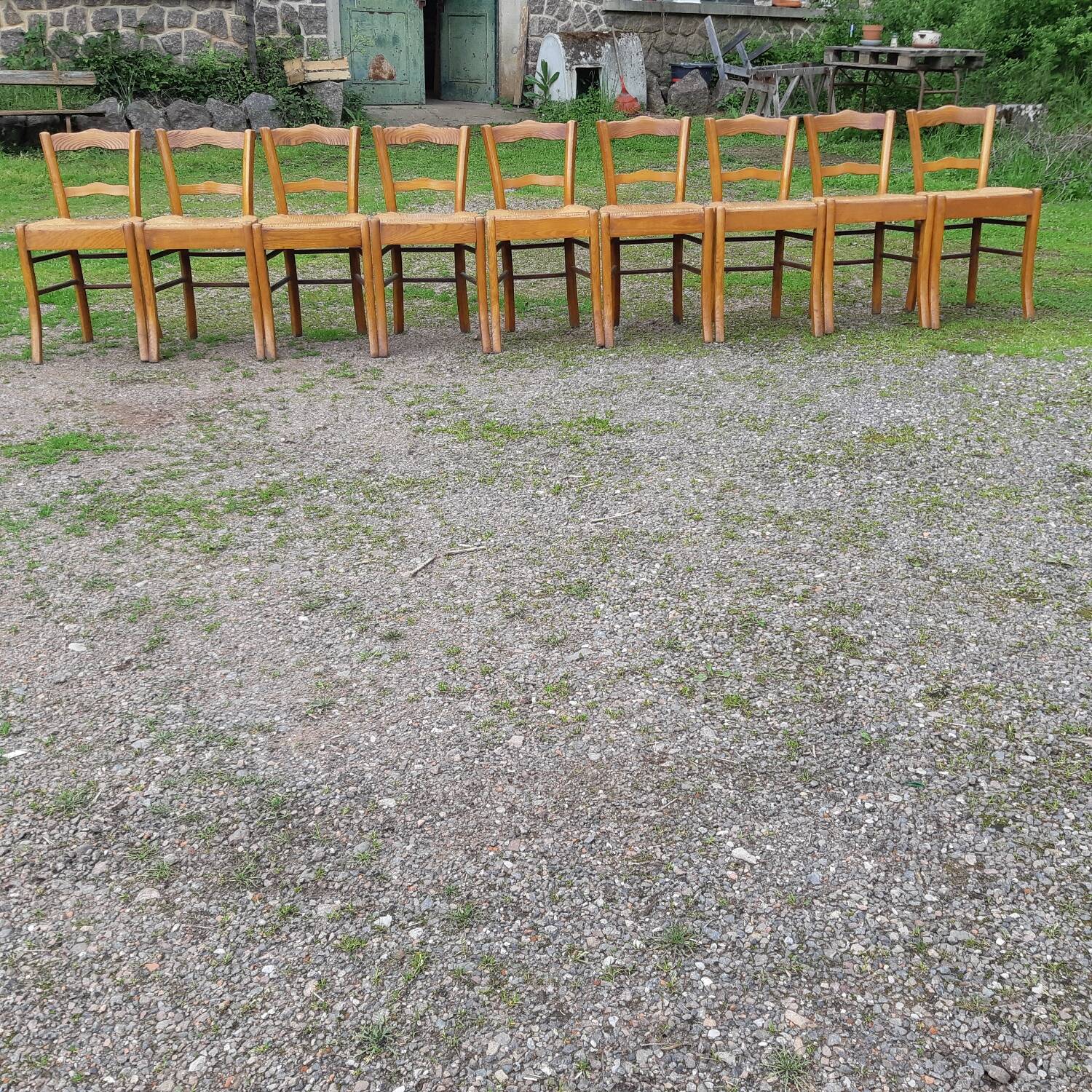 Suite of 9 straw chairs