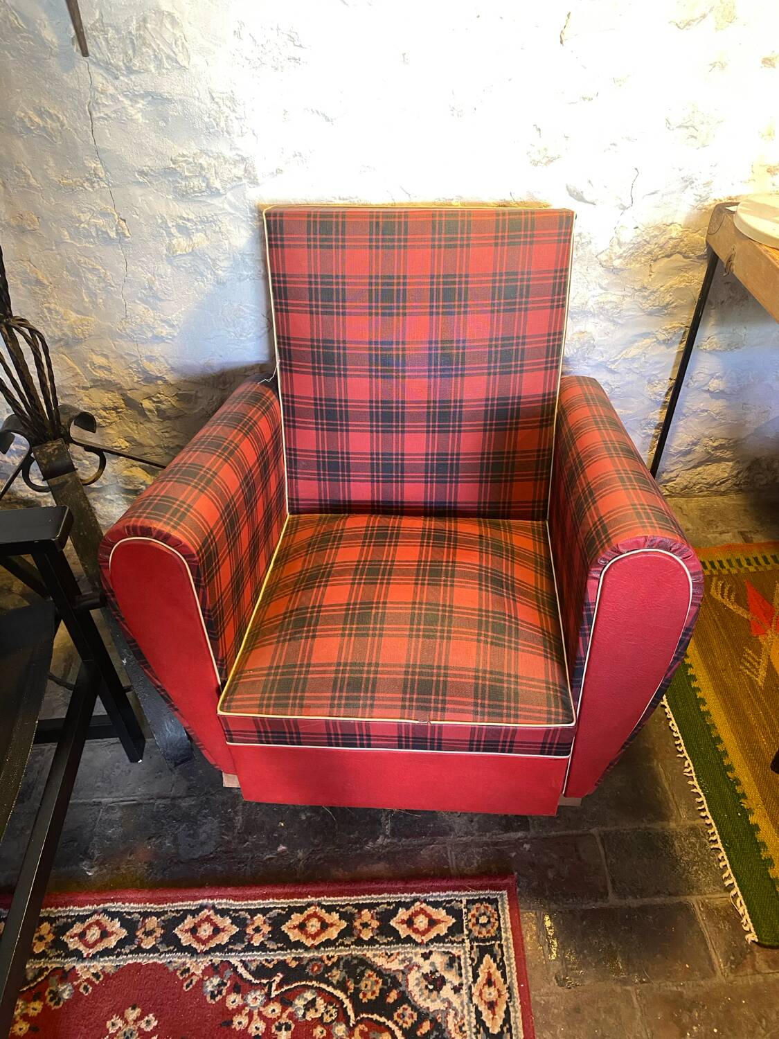 Red faux leather armchair