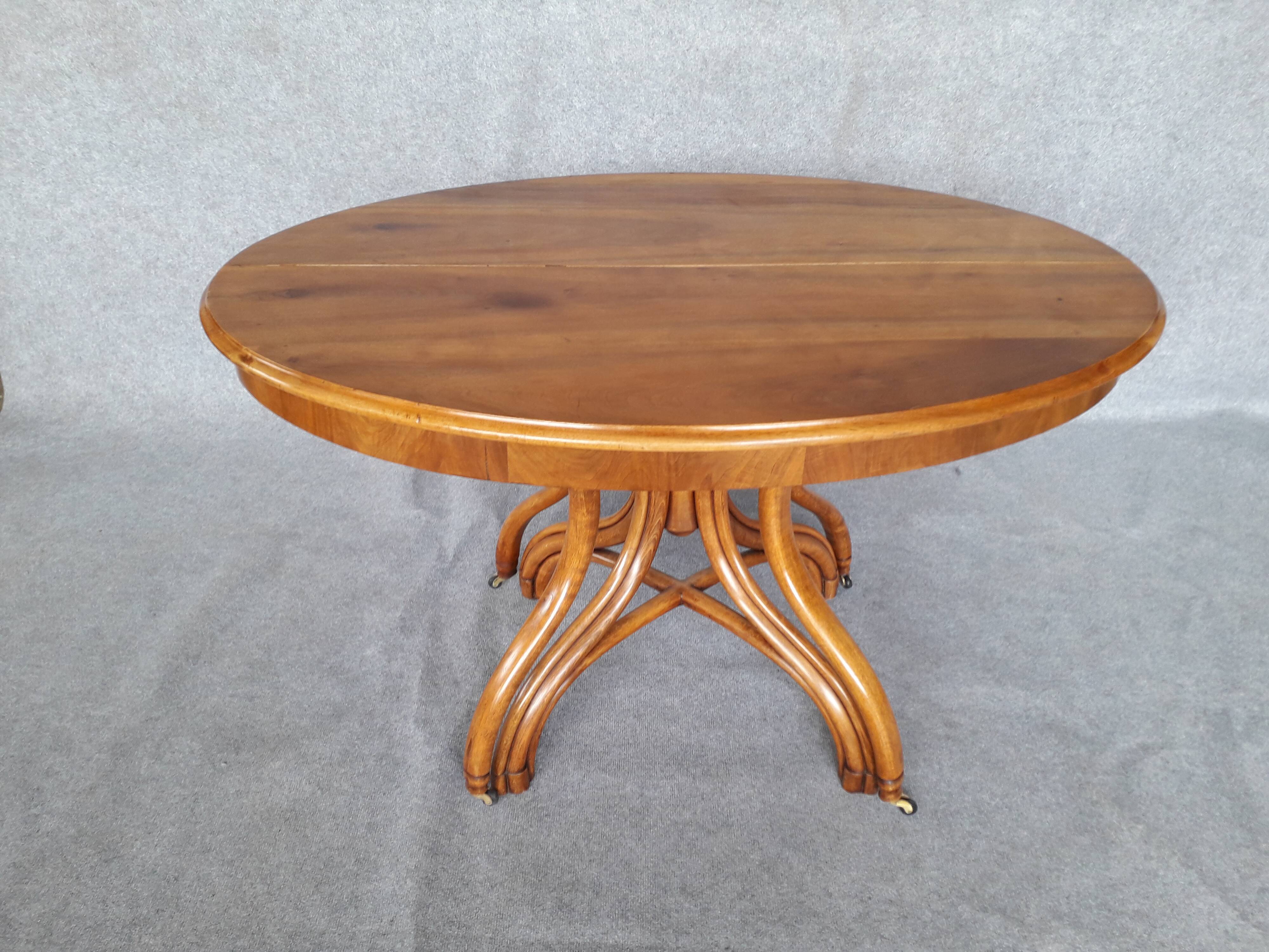 Extending table with vintage bentwood base from the end of the 19th century
