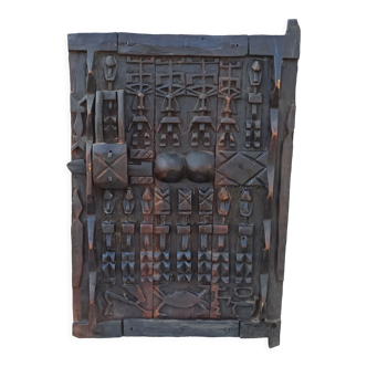 Old wooden door of attic millet African art Dogon ethnic group of Mali