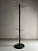 Minimalist black metal brass coat stand
