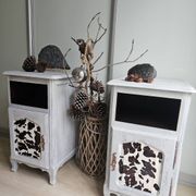 Two solid wood bedside tables with calfskin decoration.