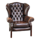 Chesterfield wing chair in dark brown leather with a luxurious appearance