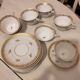 Tea/coffee cups with saucers.