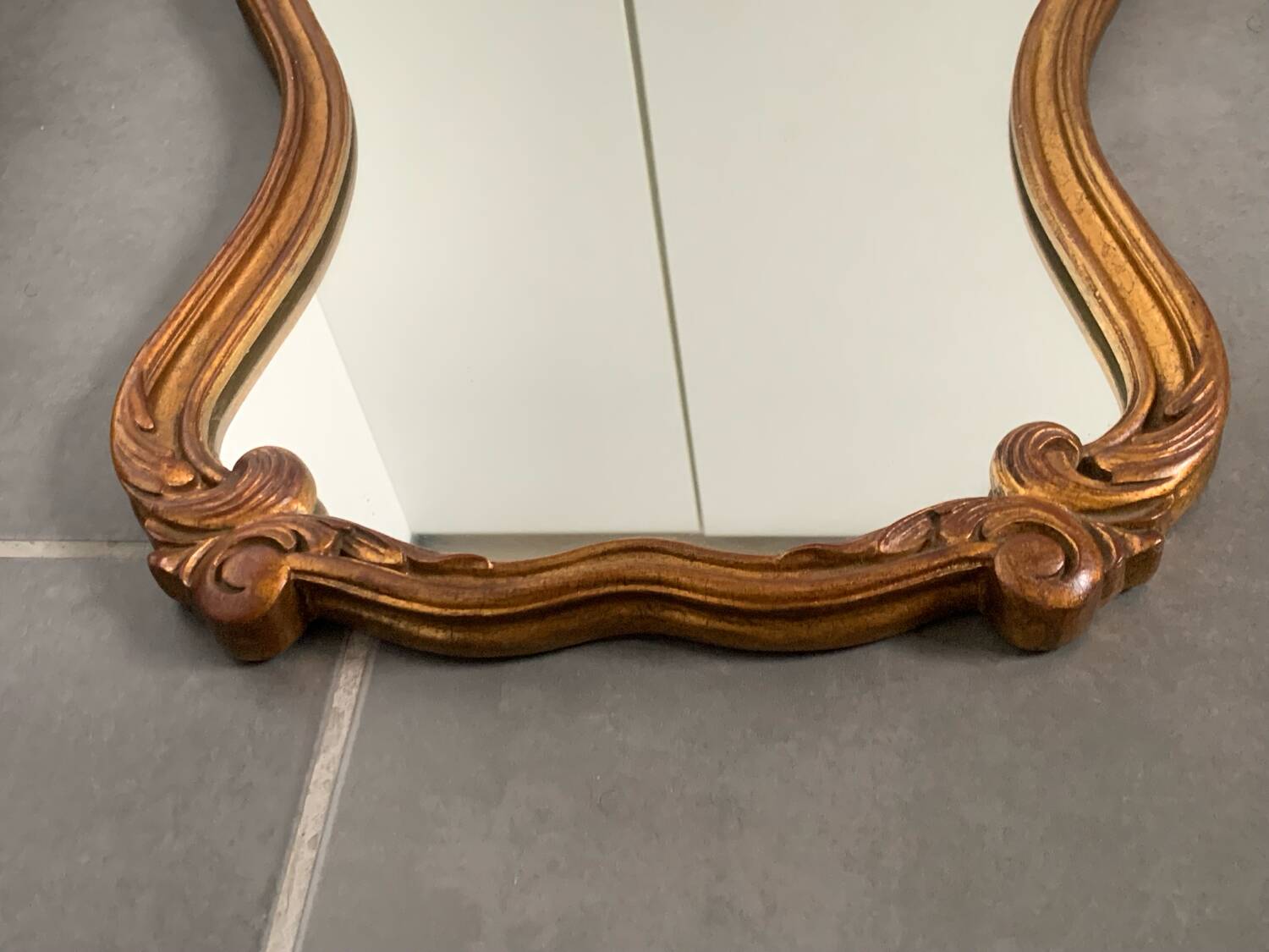 Baroque mirror in gilded wood from the 50s