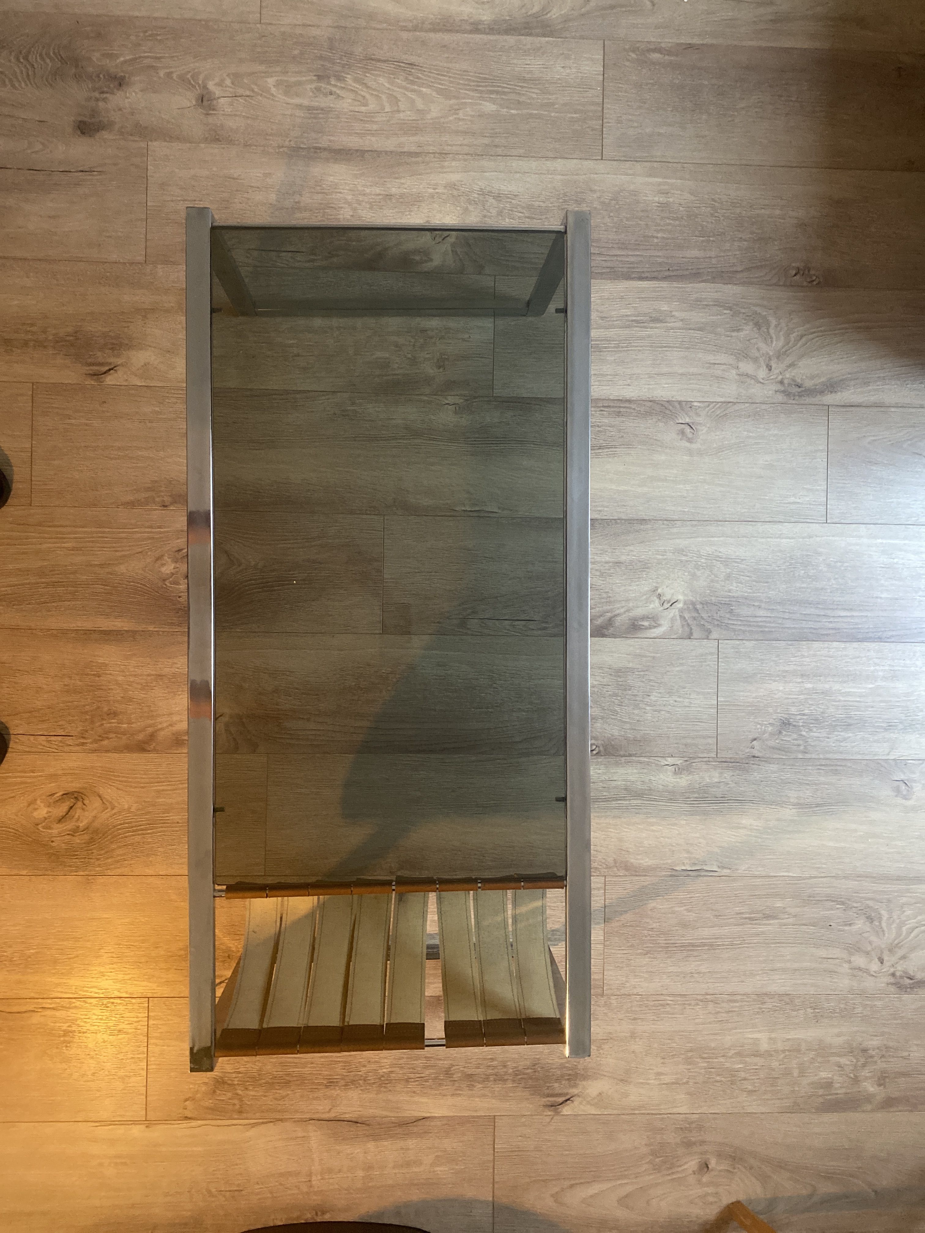 Stainless steel and glass coffee table with revised door with leatherette straps design 1970