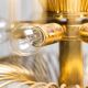 Chandelier with 10 lights in golden metal