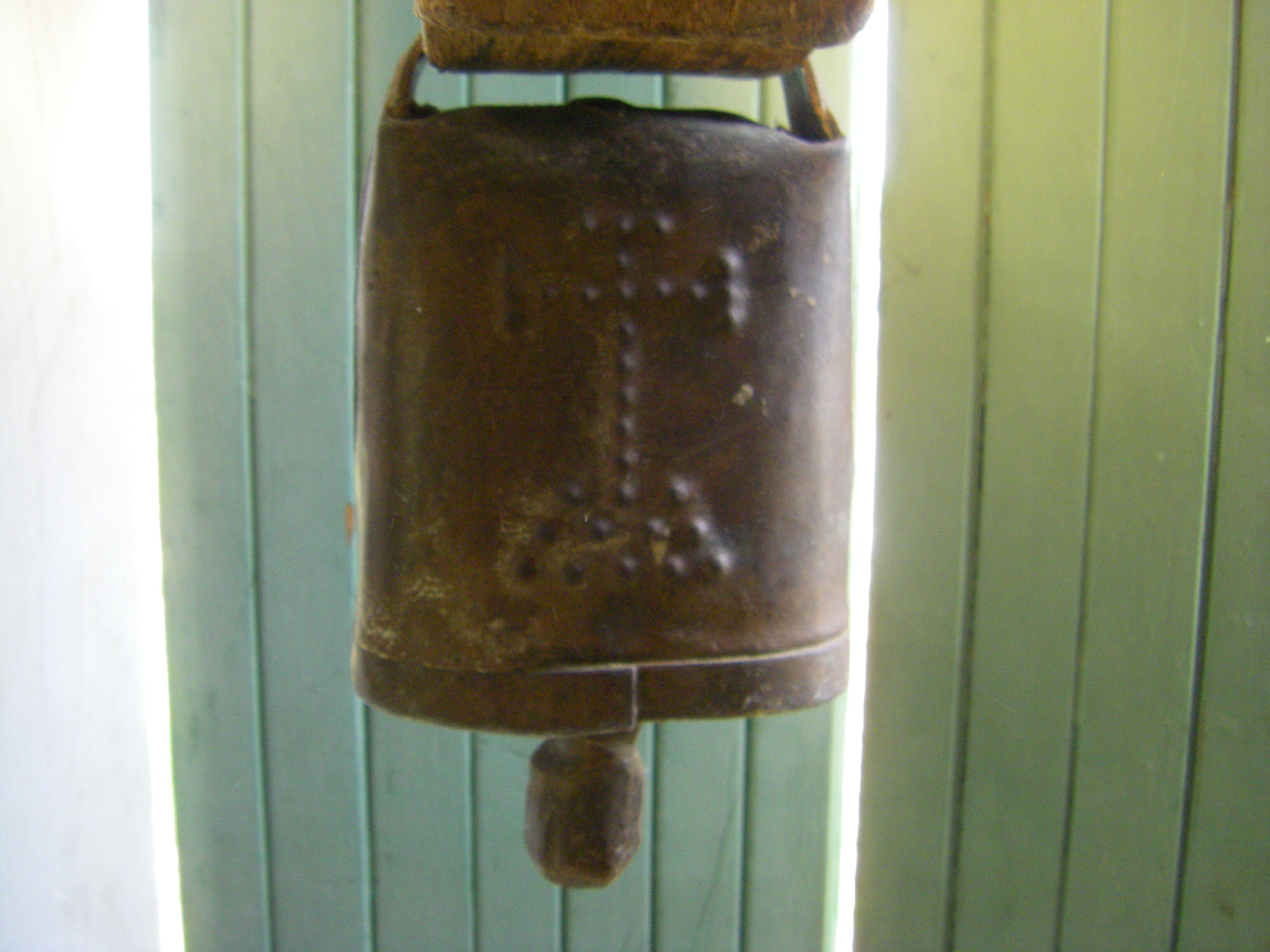 Necklace and cowbell