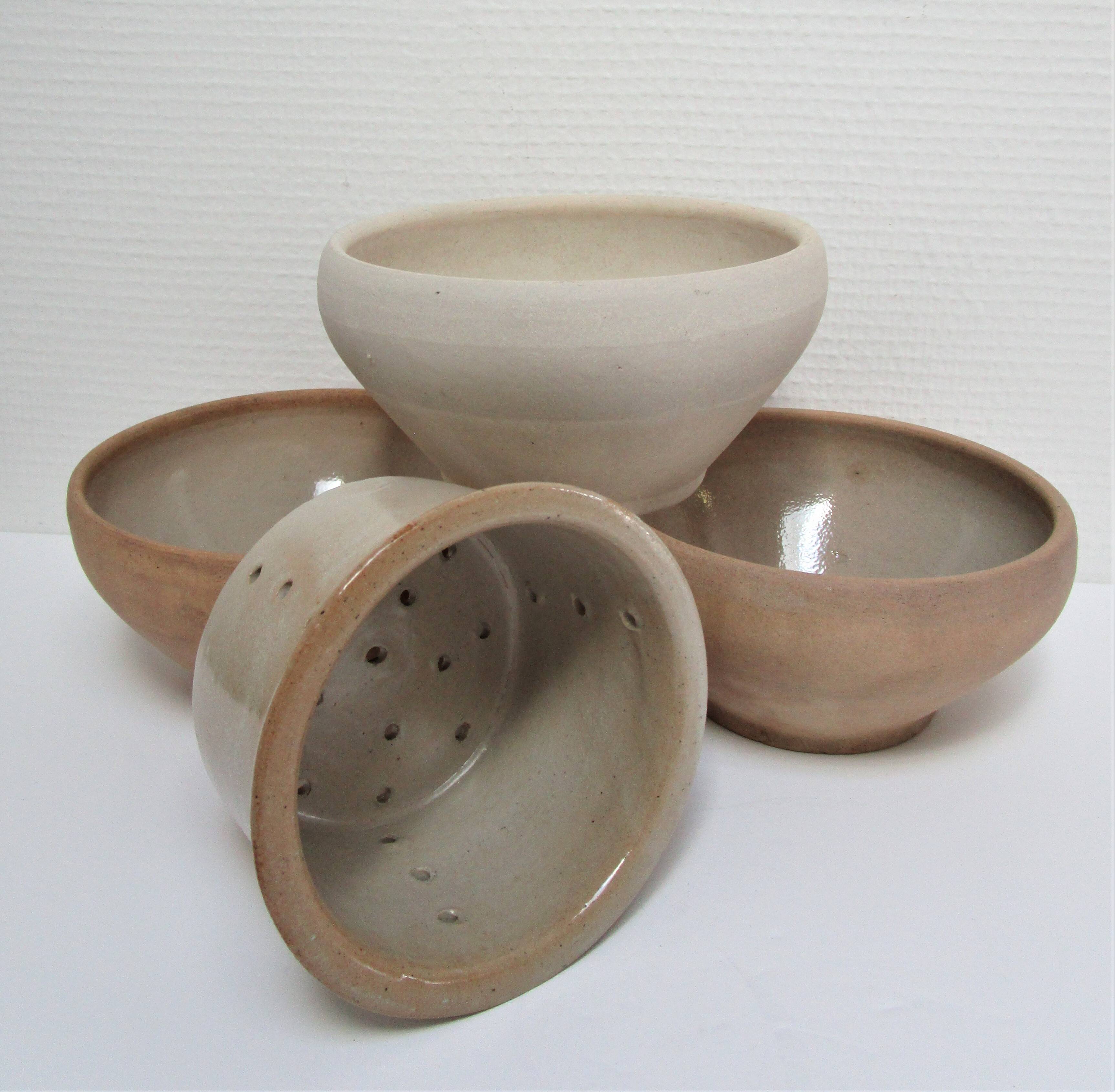 Three XL bowls and old stoneware dish