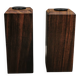 A set of salt and pepper shakers in rosewood