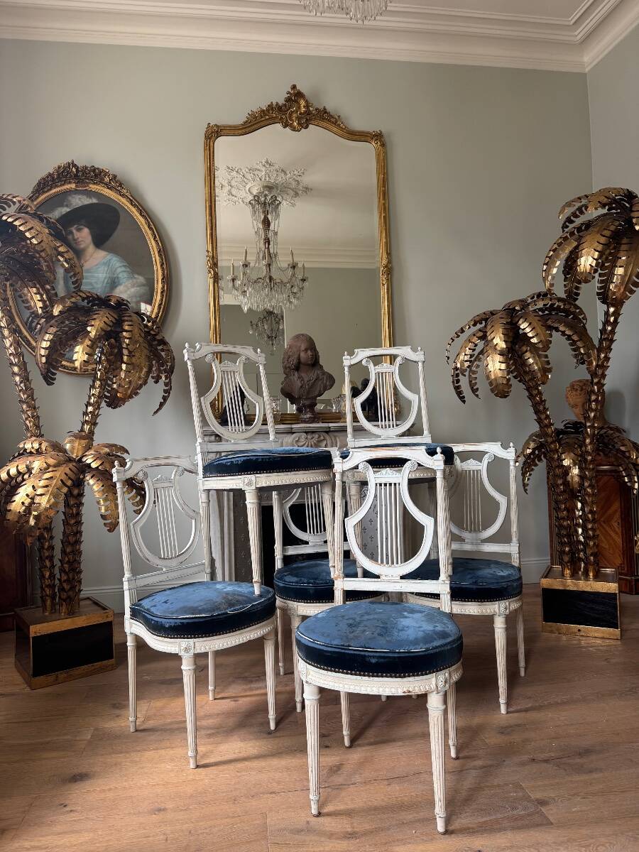 Set of 6 lyre chairs from the Napoleonic III period in painted wood in the Louis XVI style.
