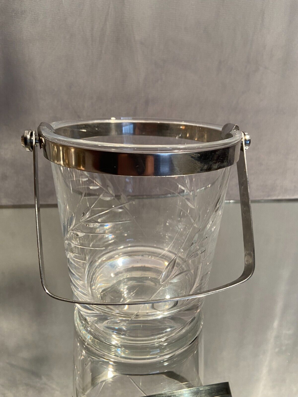 Cut crystal ice bucket with plant decoration and stainless steel frame