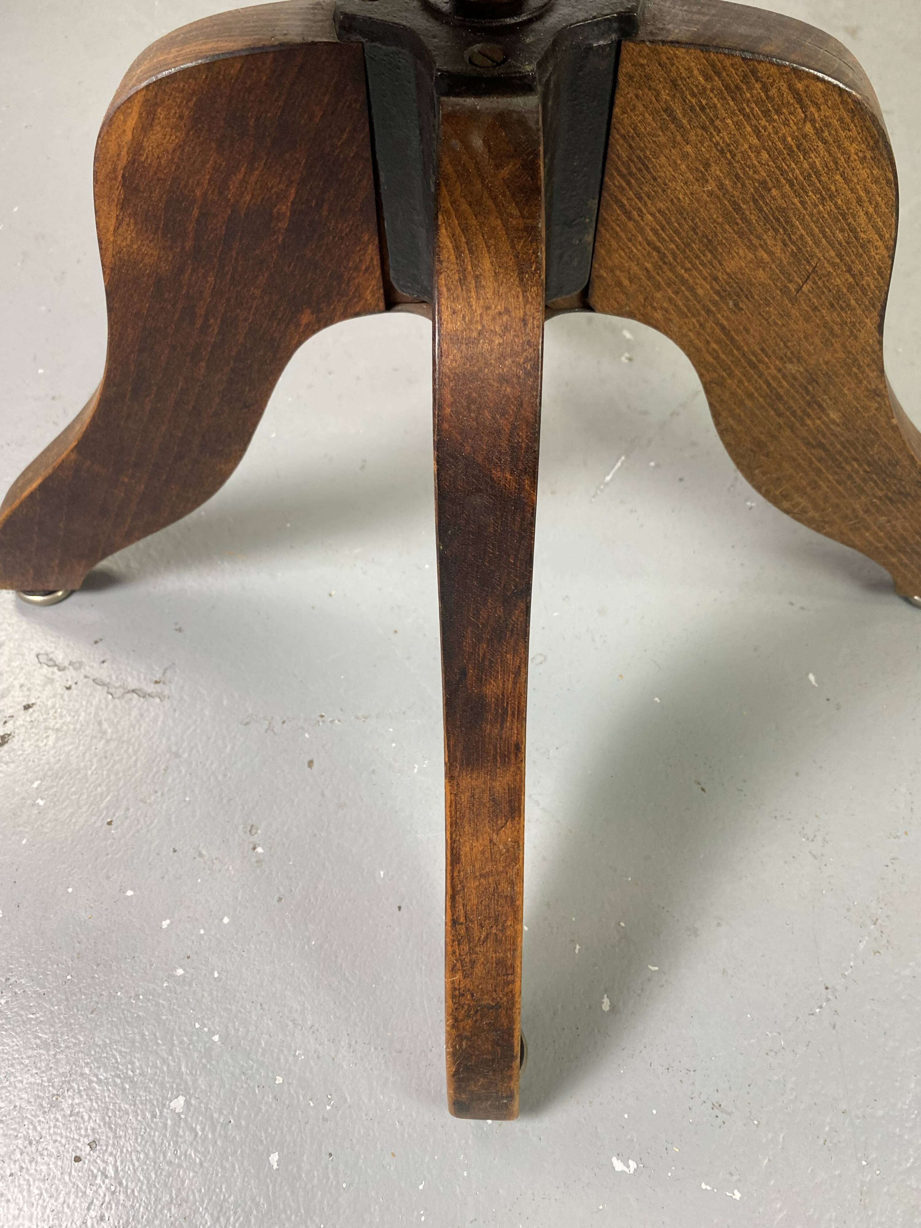 Baumann rotating wooden armchair