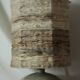 Vintage ceramic lamp with a wool shade.