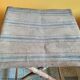 Faux bamboo folding stool and rustic striped canvas
