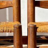 Low fireplace chair attributed to Charles Dudouyt.