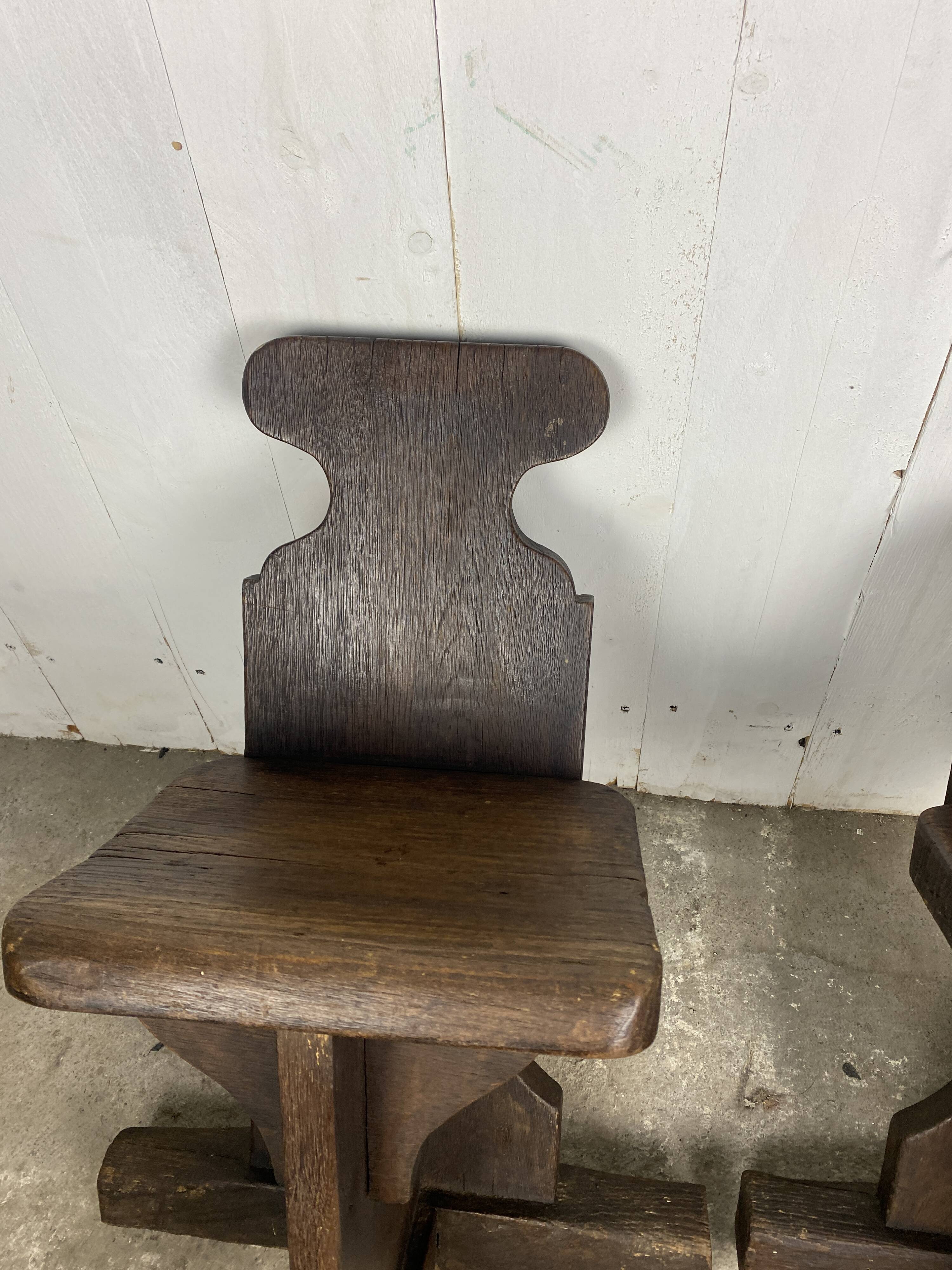 Pair of brutalist oak stools