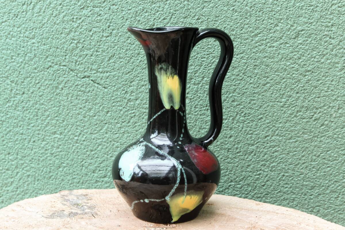 Poet Laval ceramic pitcher