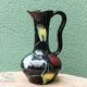 Poet Laval ceramic pitcher