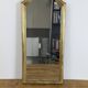Antique gold mirror known as "gendarme's hat", patinated elegance 70 x 30 cm