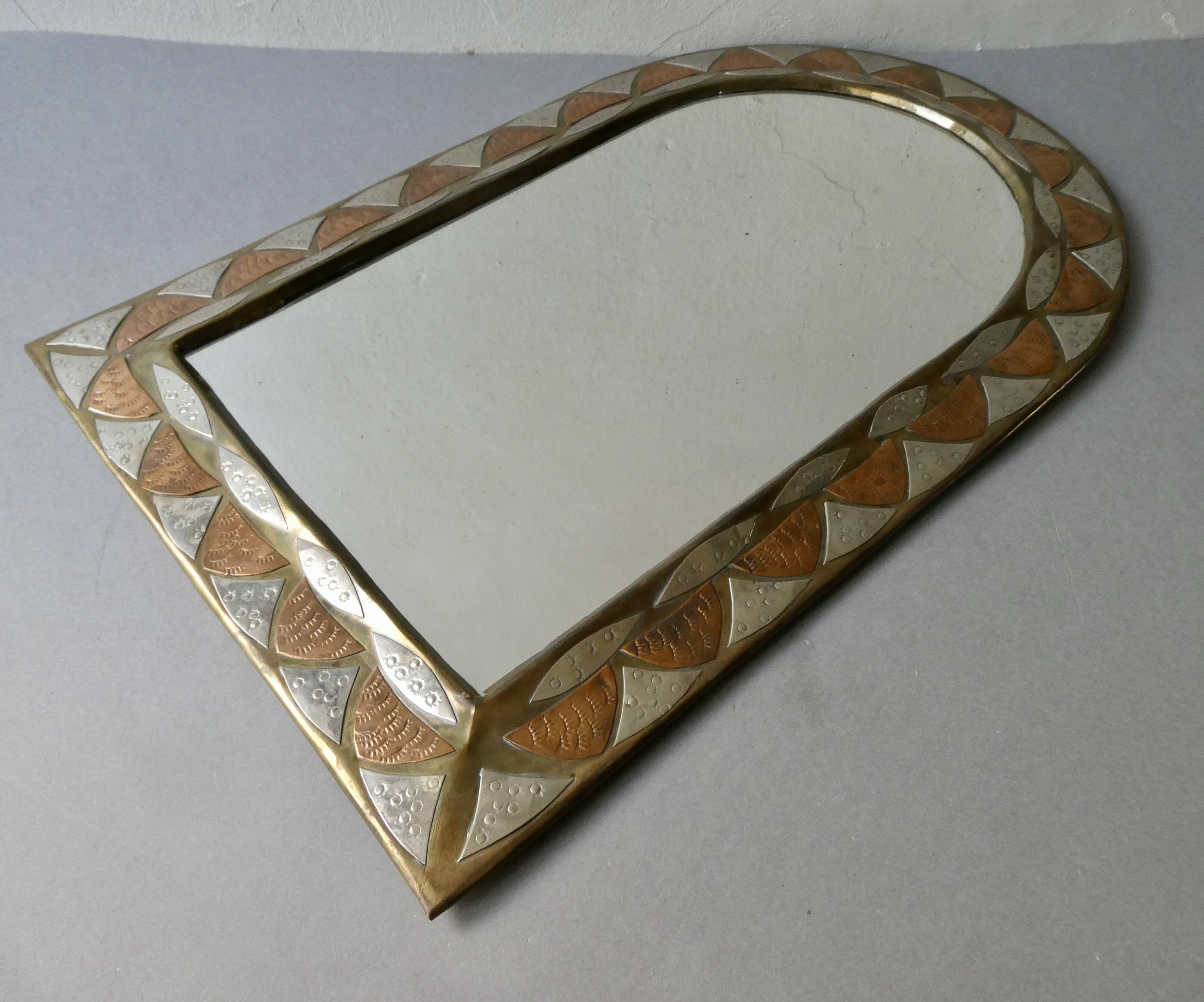 Moroccan mirror in chiseled brass, copper and silver, 70s-80s
