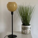Table lamp with an antique vintage glass lampshade, between gold and camel, with a golden foot
