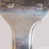 Silver plated metal service: 12 soup spoons, 12 forks and ladle.