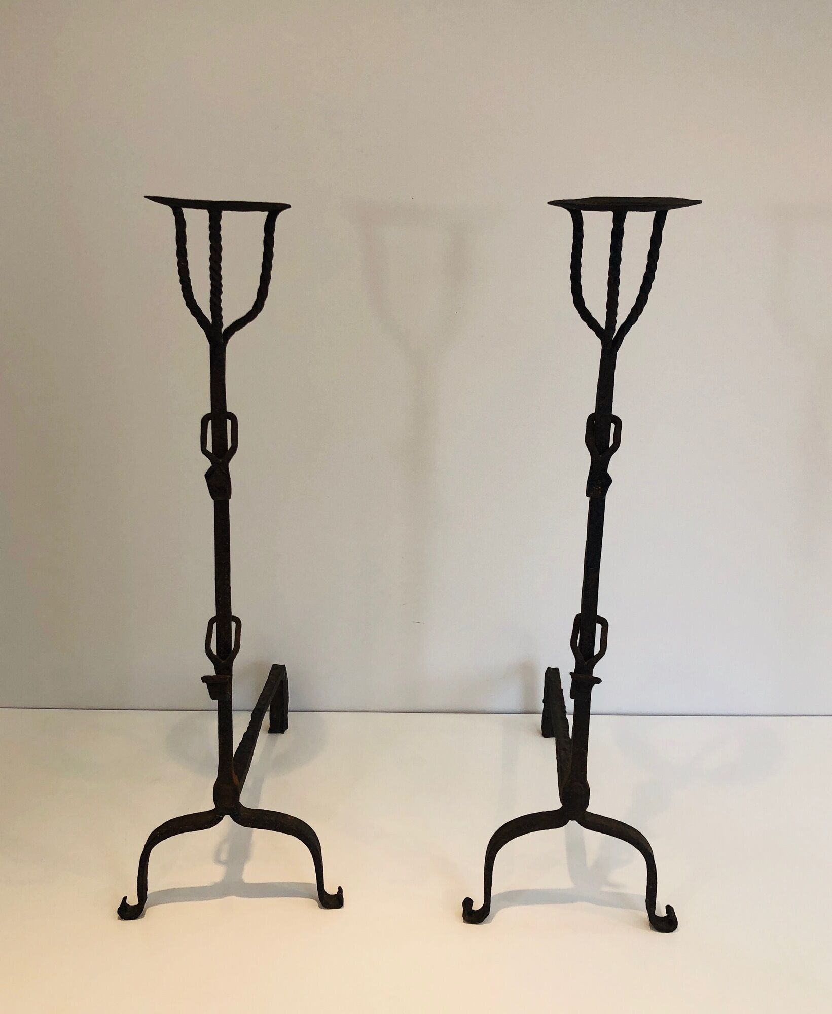Pair of wrought iron landiers. french work ,seventeenth century