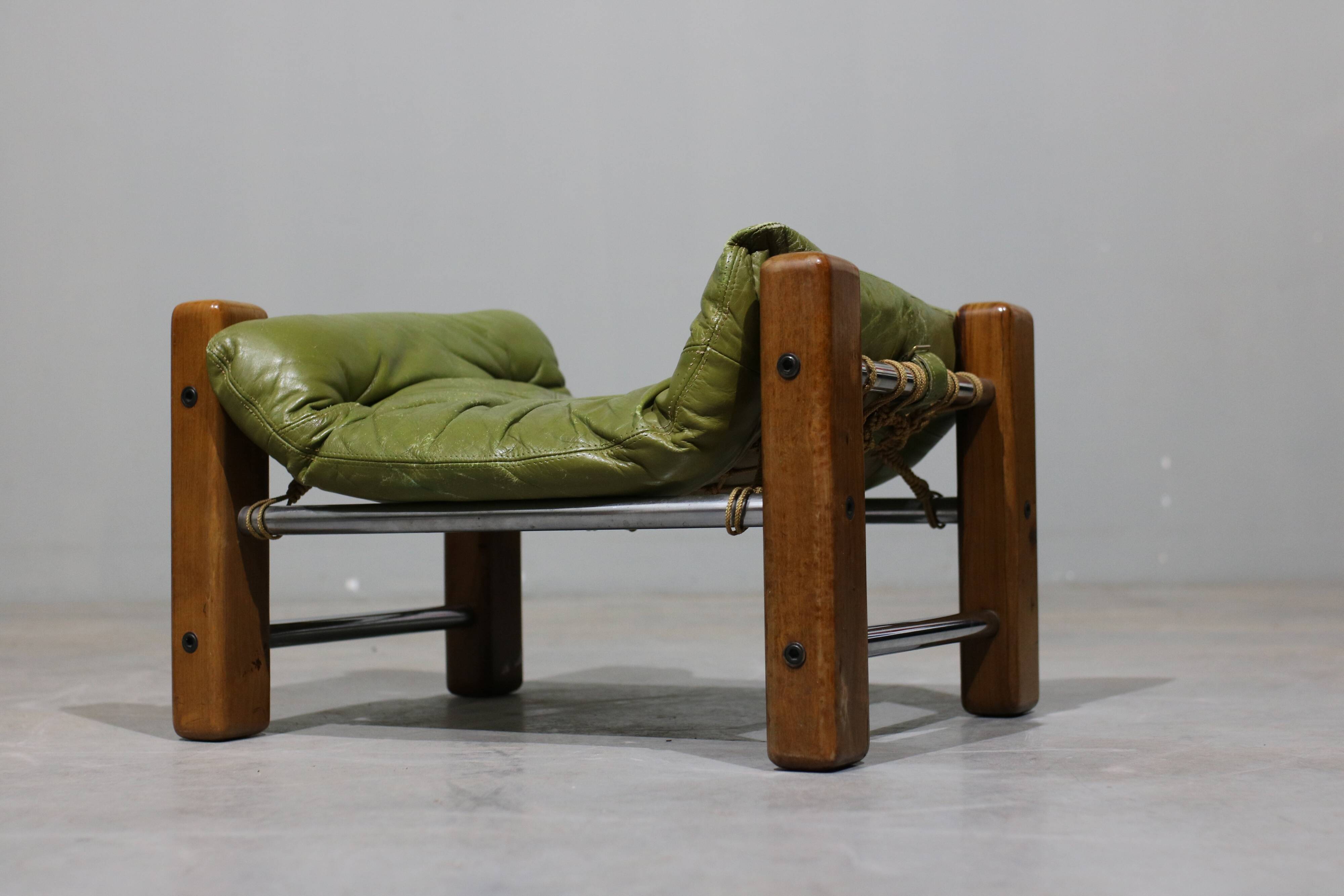 Leather Armchair and Ottoman by Jean Gillon