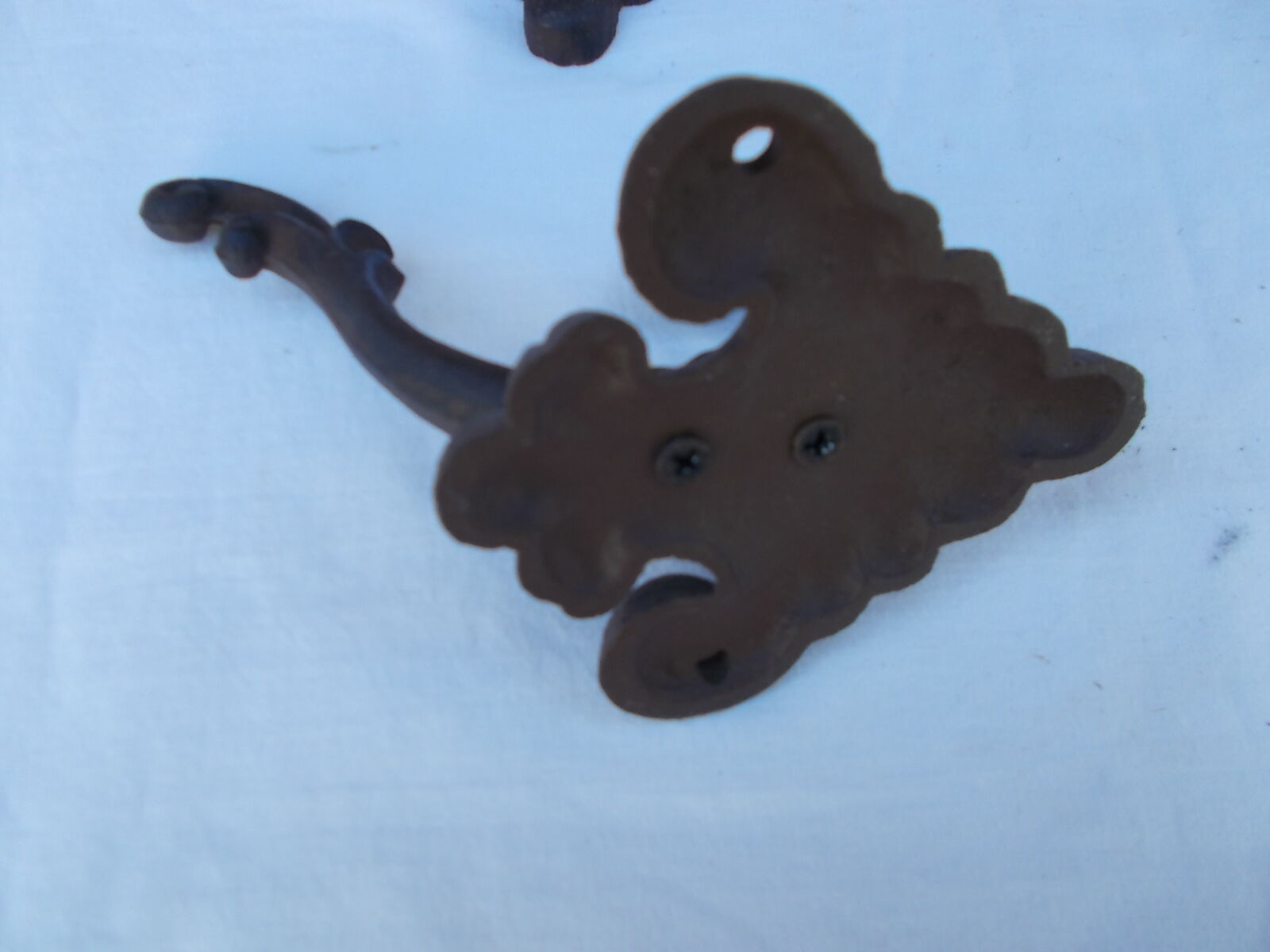 Pair of iron coatrack