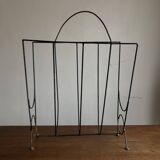 Mid-century poetic magazine rack in black metal
