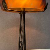 Contemporary mushroom lamp, wrought iron base and orange glass shell with blue hues in the art deco style