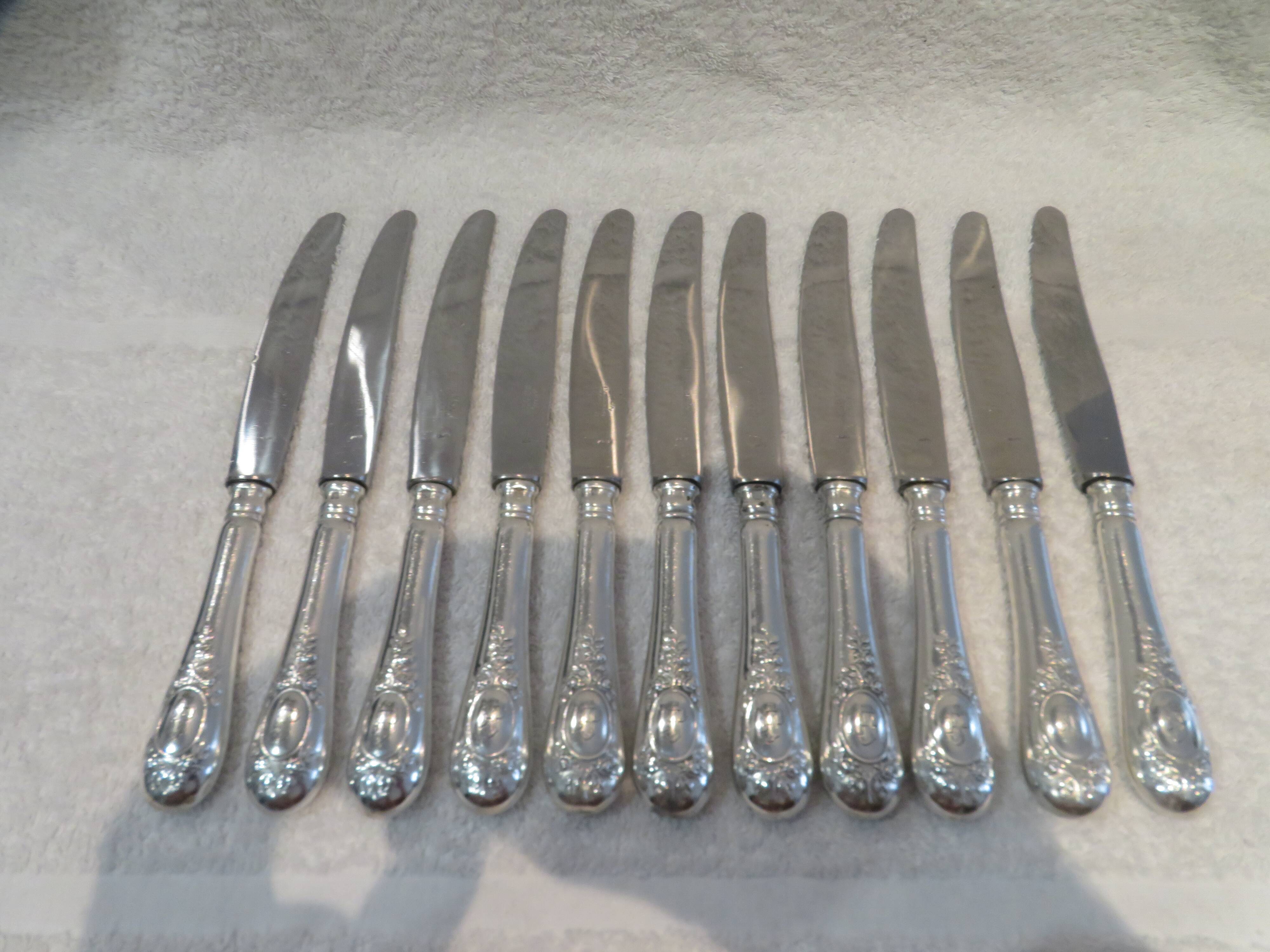 11 silver plated table knives, Ercuis goldsmith, Louis XVI roses model