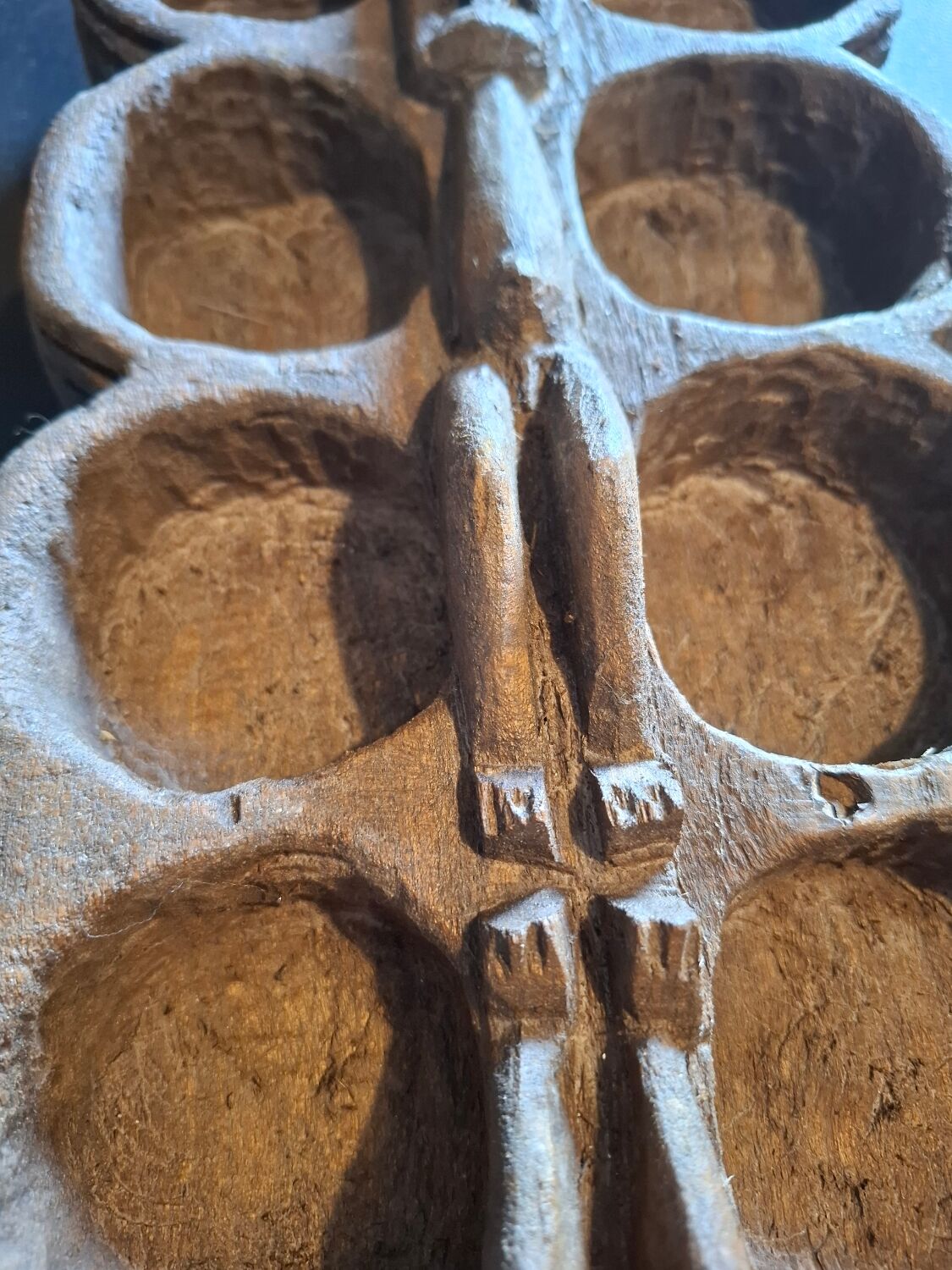 Genuine traditional Awalé made of carved solid wood.